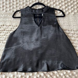 Black shiny tank top from The Boutique
